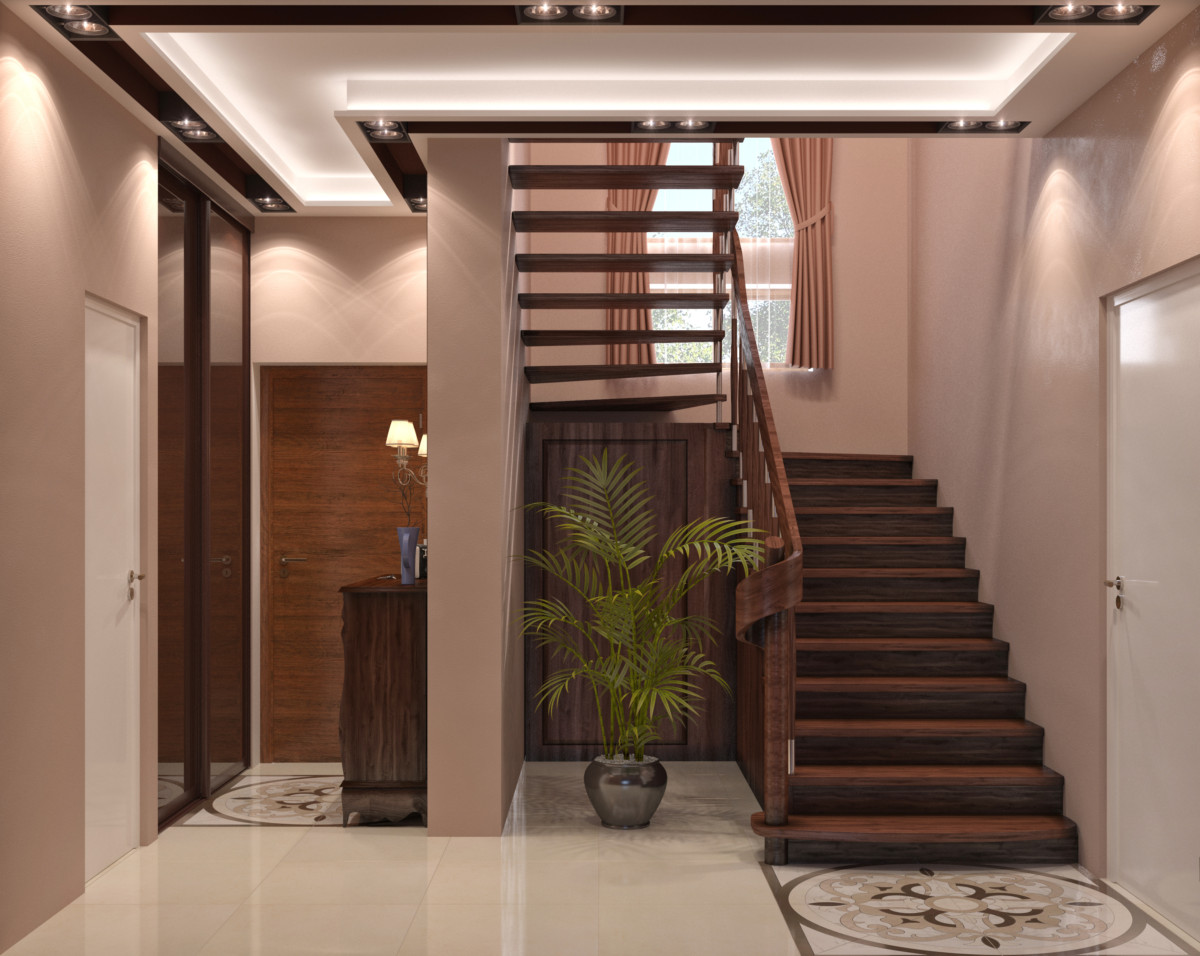 Холл в загородном доме имеет функциональную нагрузку — конструкция лестницы, гардеробная и парадная зона.